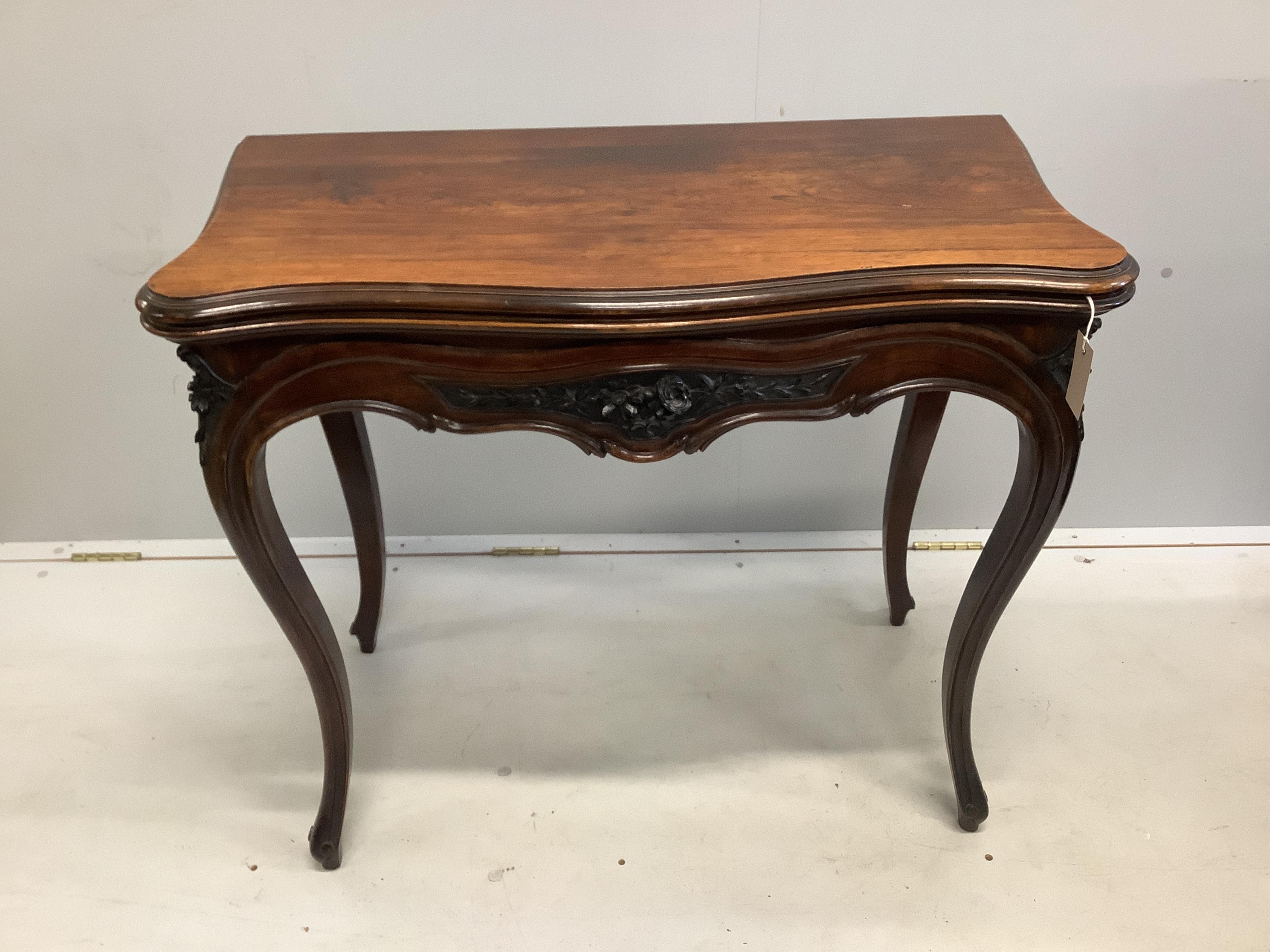 A 19th century French rosewood folding card table, width 84cm, depth 43cm, height 75cm